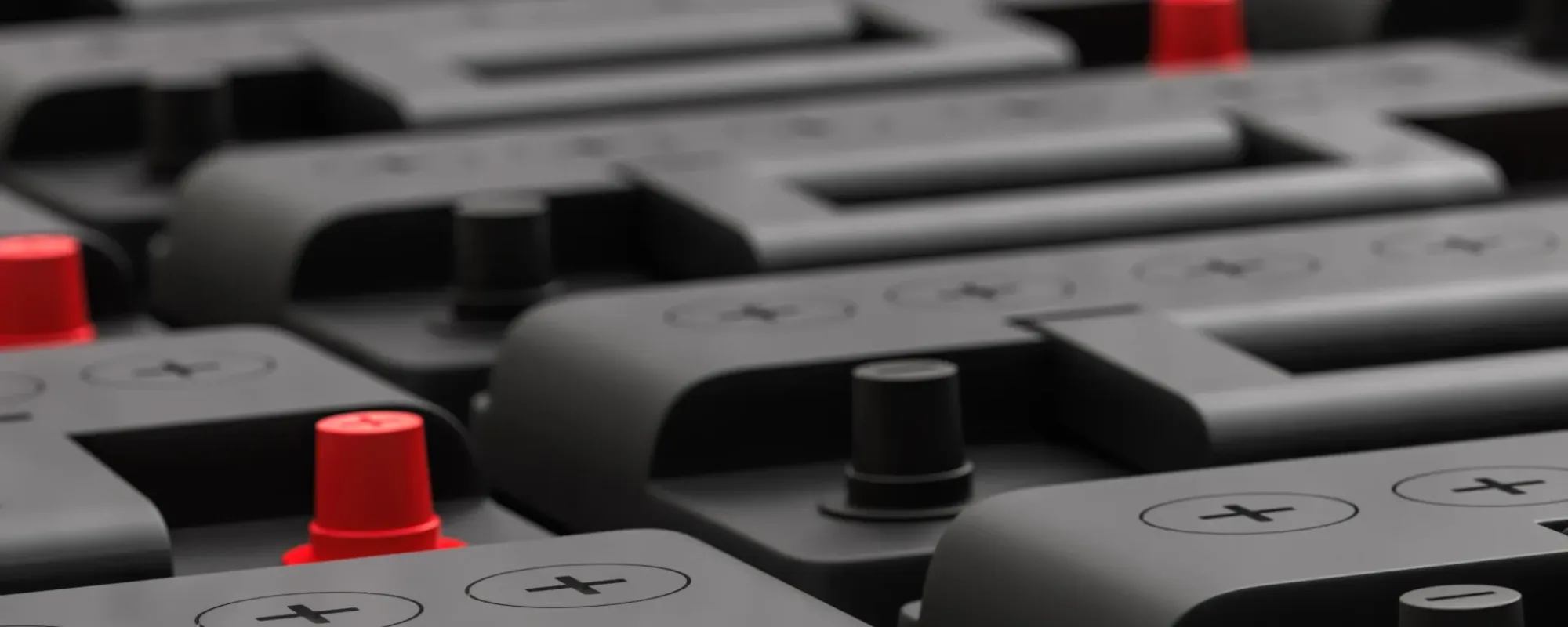 3D render of rows of new 12V car batteries